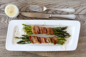 paleo bacon wrapped asparagus lemon butter sauce side