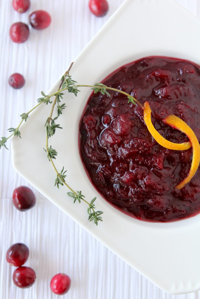 Orange + Honey Cranberry Sauce from the Whole Smiths. Amazing flavors and sweetened with just honey! Paleo friendly and a MUST have at any Thanksgiving.