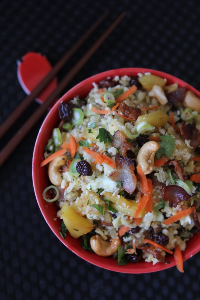 Pineapple Fried Cauliflower Rice by the Whole Smiths - Easy to make and great for leftovers! Paleo friendly, gluten-free and Whole30 compliant. 