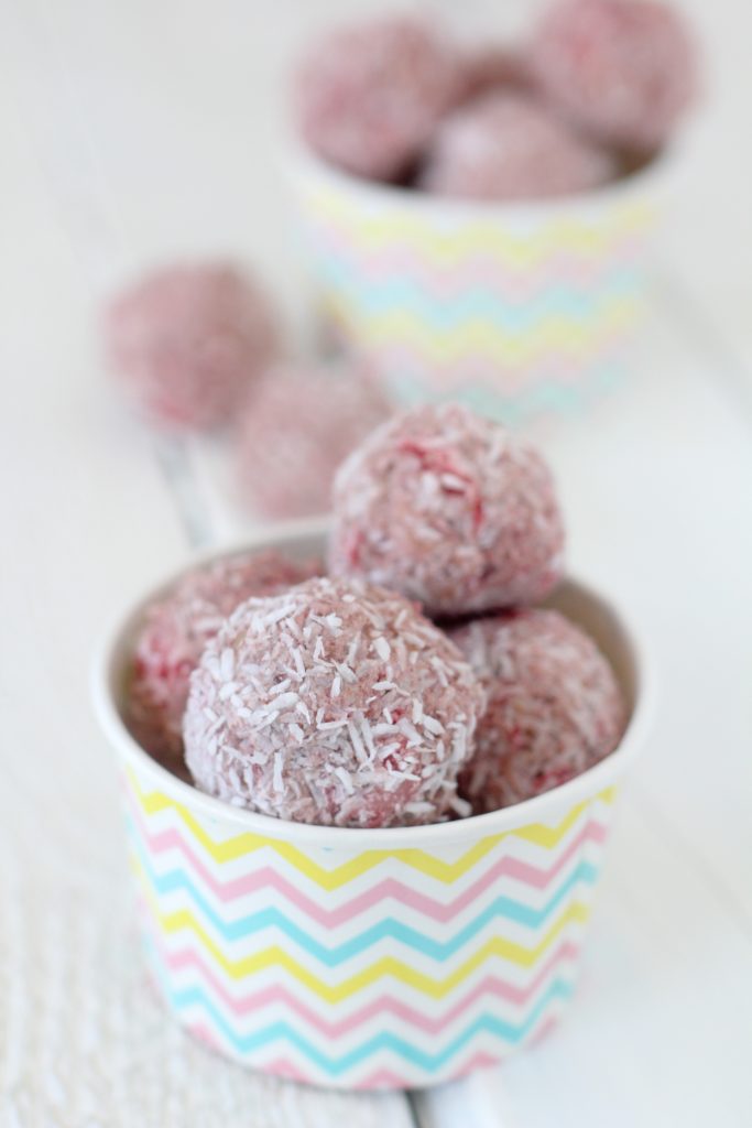 Strawberry Coconut Bon-Bons from the Whole Smiths. Fresh strawberries, coconut butter and flax. Gluten-free, refined sugar-free, paleo friendly. 