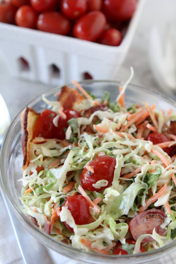 paleo Cole Slaw with bacon lettuce and tomatoes in a glass bowl