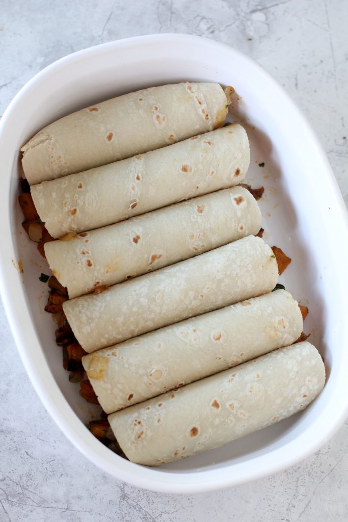 Crazy easy Butternut Squash Enchiladas from the Whole Smiths. Paleo-friendly, gluten-free and vegan optional.