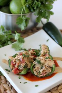 Chicken Stuffed Poblano Peppers from the Whole Smiths. Easy-to-make, paleo friendly, grain free and Whole30 compliant with modification.