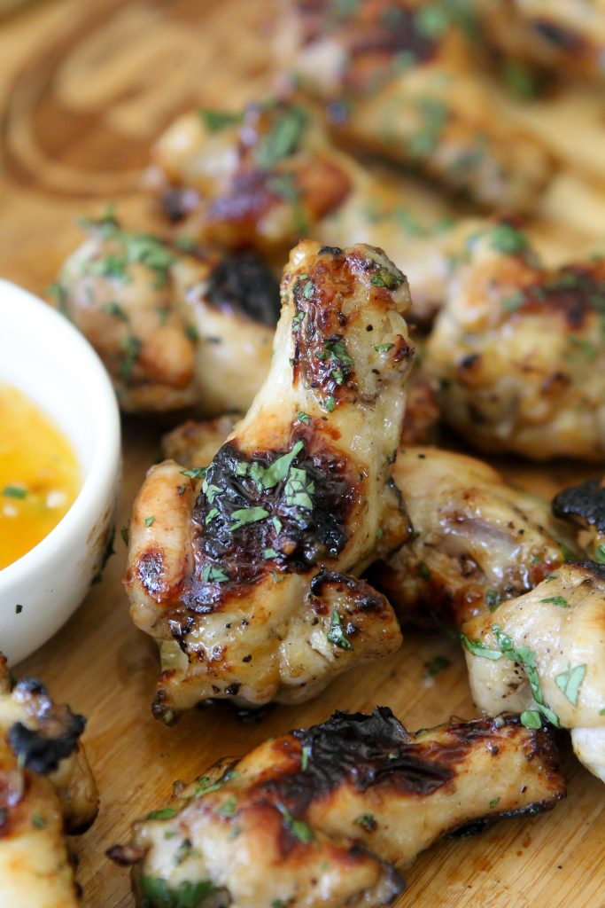 Whole30 compliant Peach + Jalapeño Chicken Wings from the Whole Smiths. The perfect appetizer for any gathering. Particularly during football season! 