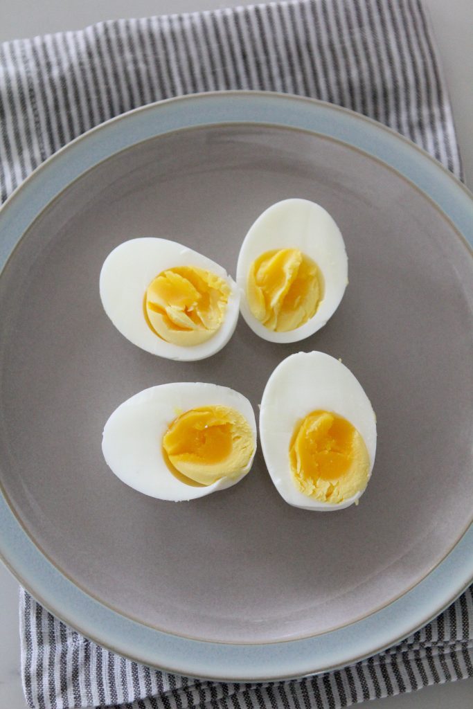 The simplest, easiest way to make flawless hardboiled eggs at home every time. Brought to you in joint collaboration from Michelle of the Whole Smiths and Kristen from Living, Loving Paleo.