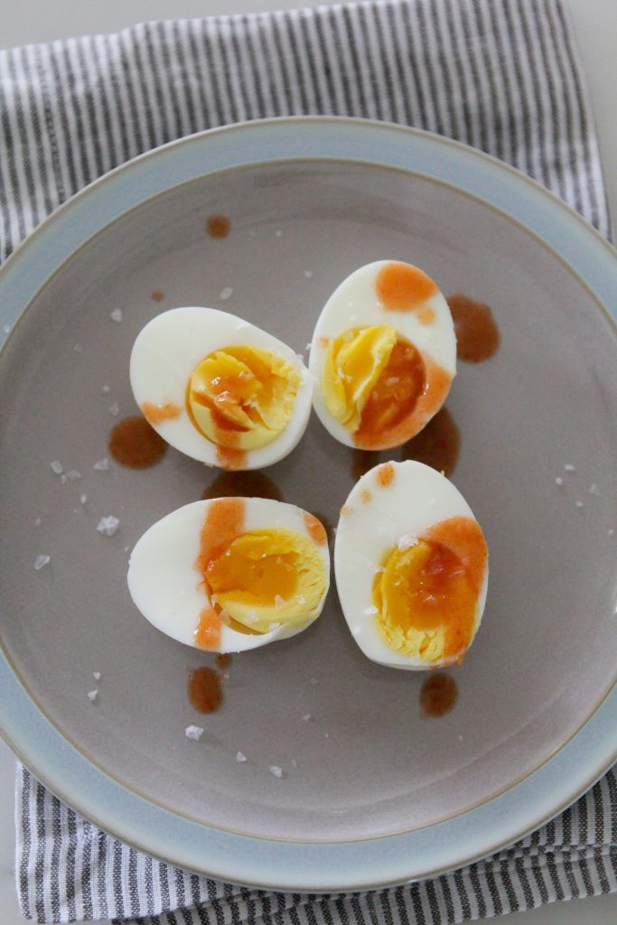 The simplest, easiest way to make flawless hardboiled eggs at home every time. Brought to you in joint collaboration from Michelle of the Whole Smiths and Kristen from Living, Loving Paleo.