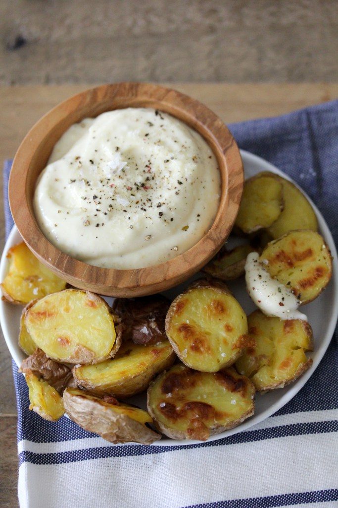 Whole30 compliant Patatas Bravas + Garlic Aioli by the Whole Smiths. Or in other words, the best, crispiest potatoes and garlic dipping sauce you'll ever had.