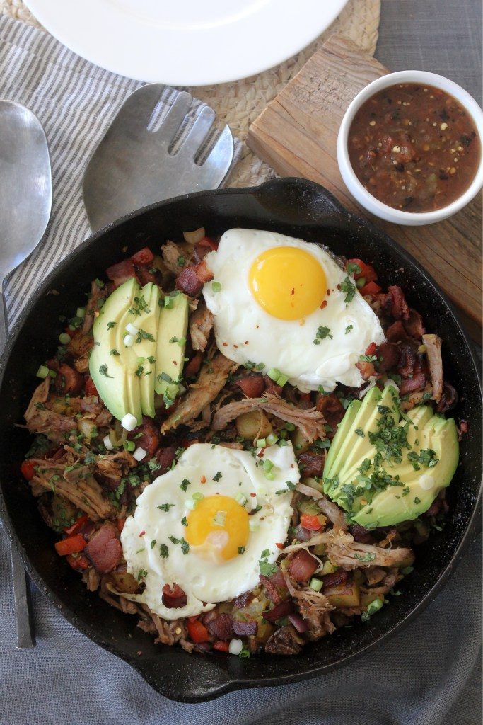 A delicious paleo Pulled Pork + Bacon Hash from the Whole Smiths that you'll want to make over and over again. Whole30 and gluten-free. 